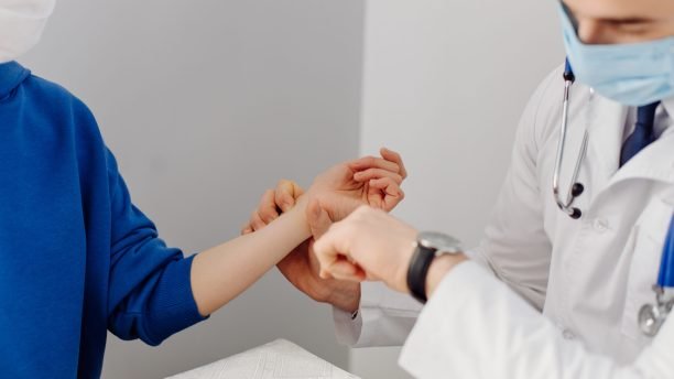 Doctor examines the patient . Medicine and health care concept.